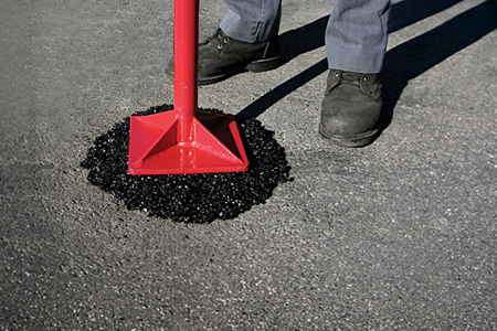 Reparación de baches en asfalto con asfalto en frío